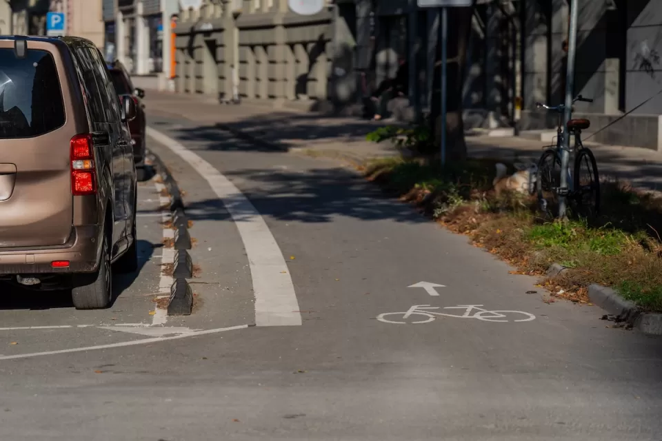 Parking protected bike lane in Riga, Latvia.
